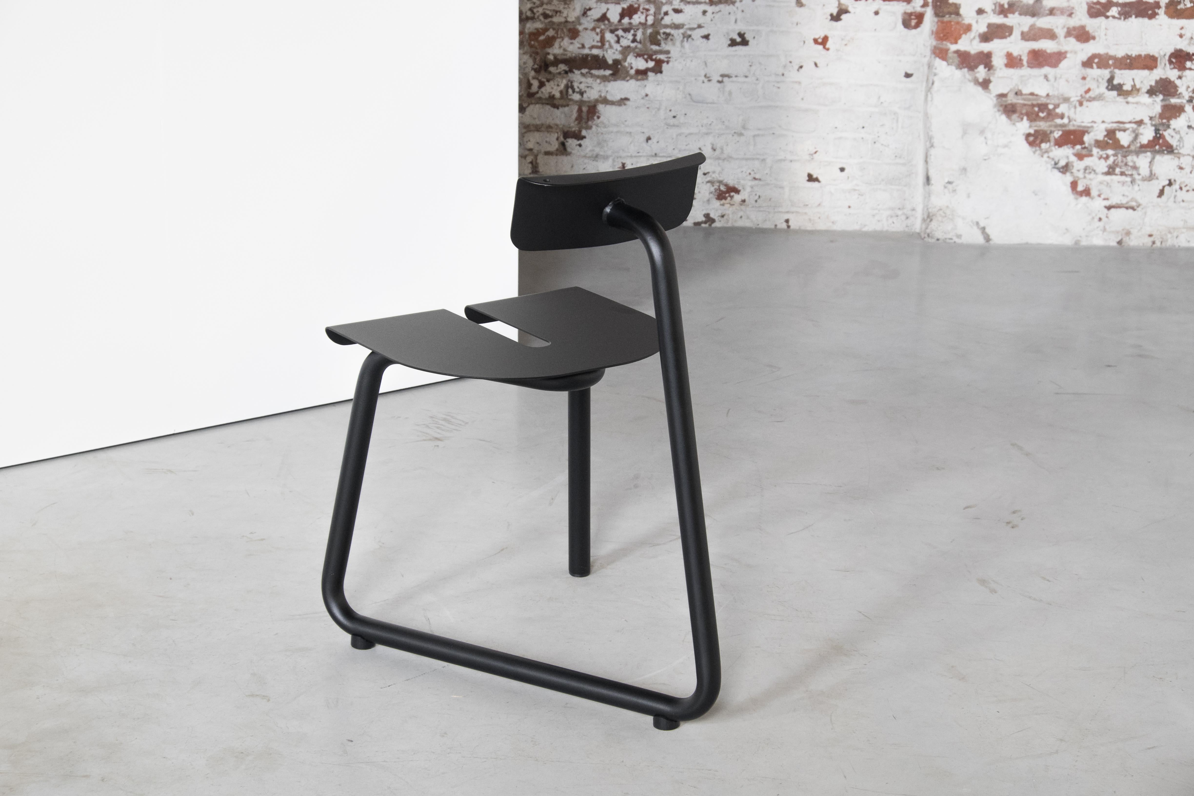 SPC Black Chair by Atelier Thomas Serruys
Dimensions: D65 x W43 x H46
Materials: Steel, Powder Coated

Steel chair made of one shaped tube with sheet steel seat and backrest. Powdercoated, Ertalon footrests. 

Perfect for outdoor use, no