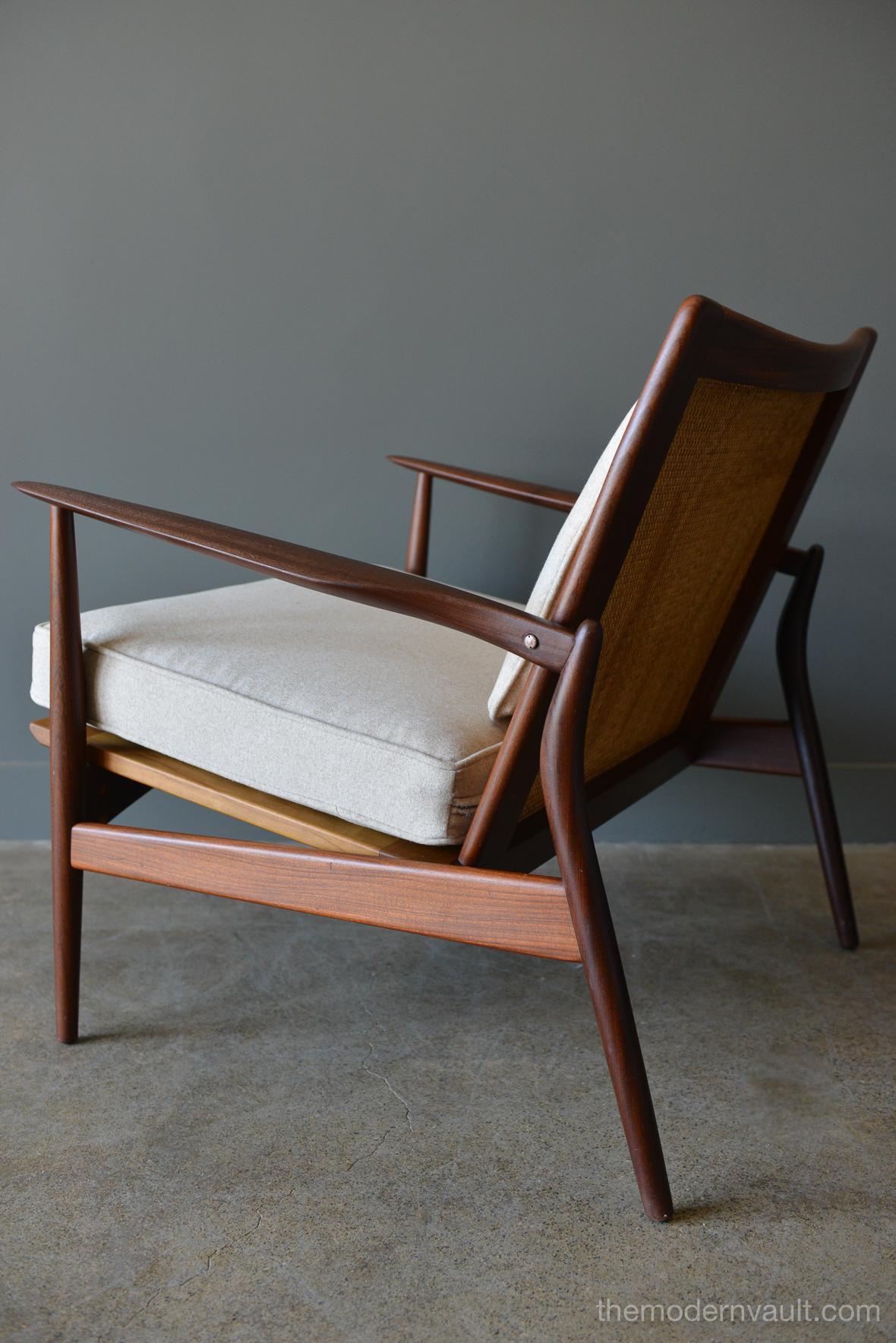 Early spear chair model 544-15 by I.B. Kofod Larsen, circa 1960. Stained beech and teak frame in original condition with original cane. Frame and cane is original and unrestored. Cushions have been restored to exacting dimensions in a beautiful tan