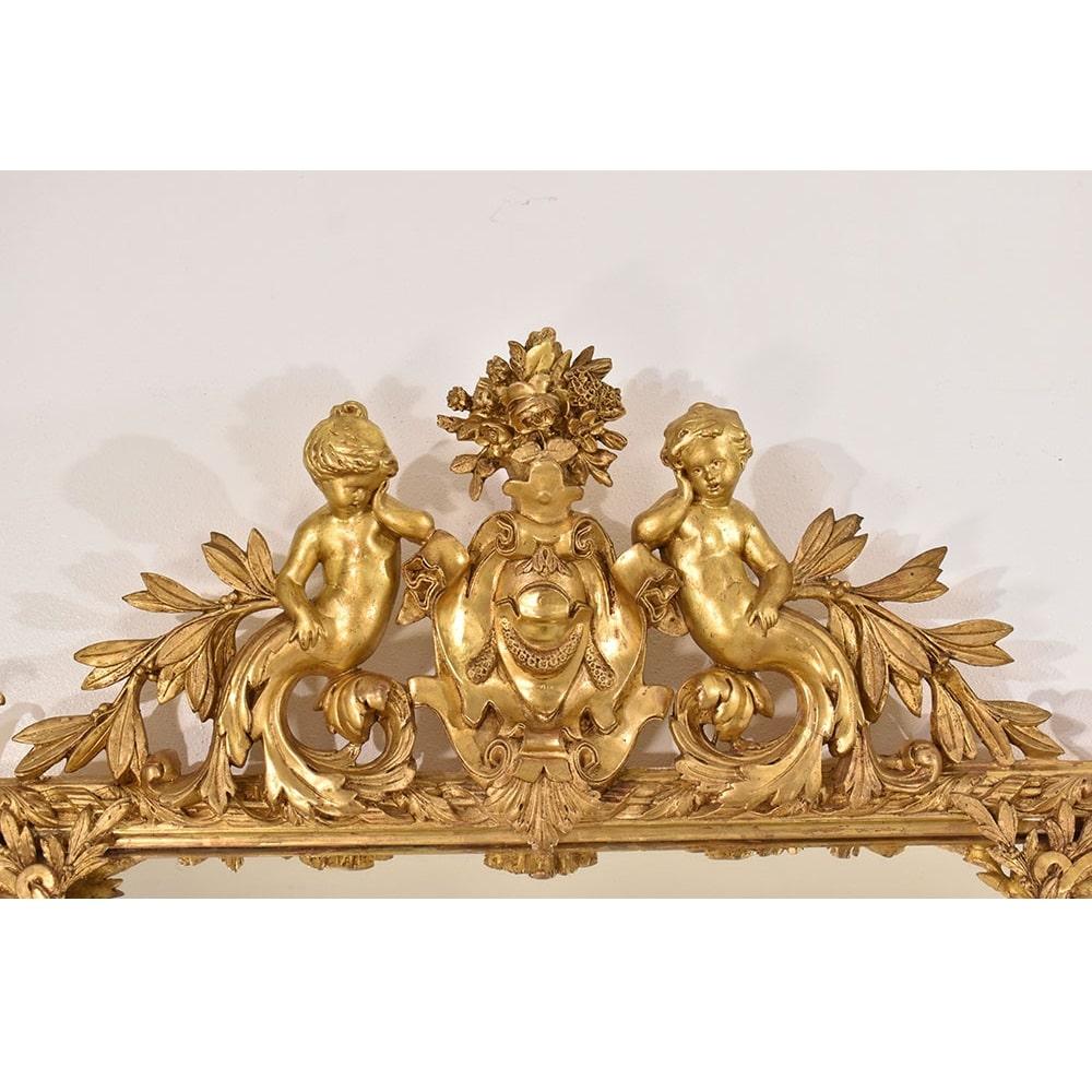 Luigi Filippo Specchiera Antica Con Putti E Volute, Dorata In Foglia Di Oro Zecchino,  XIX. in vendita