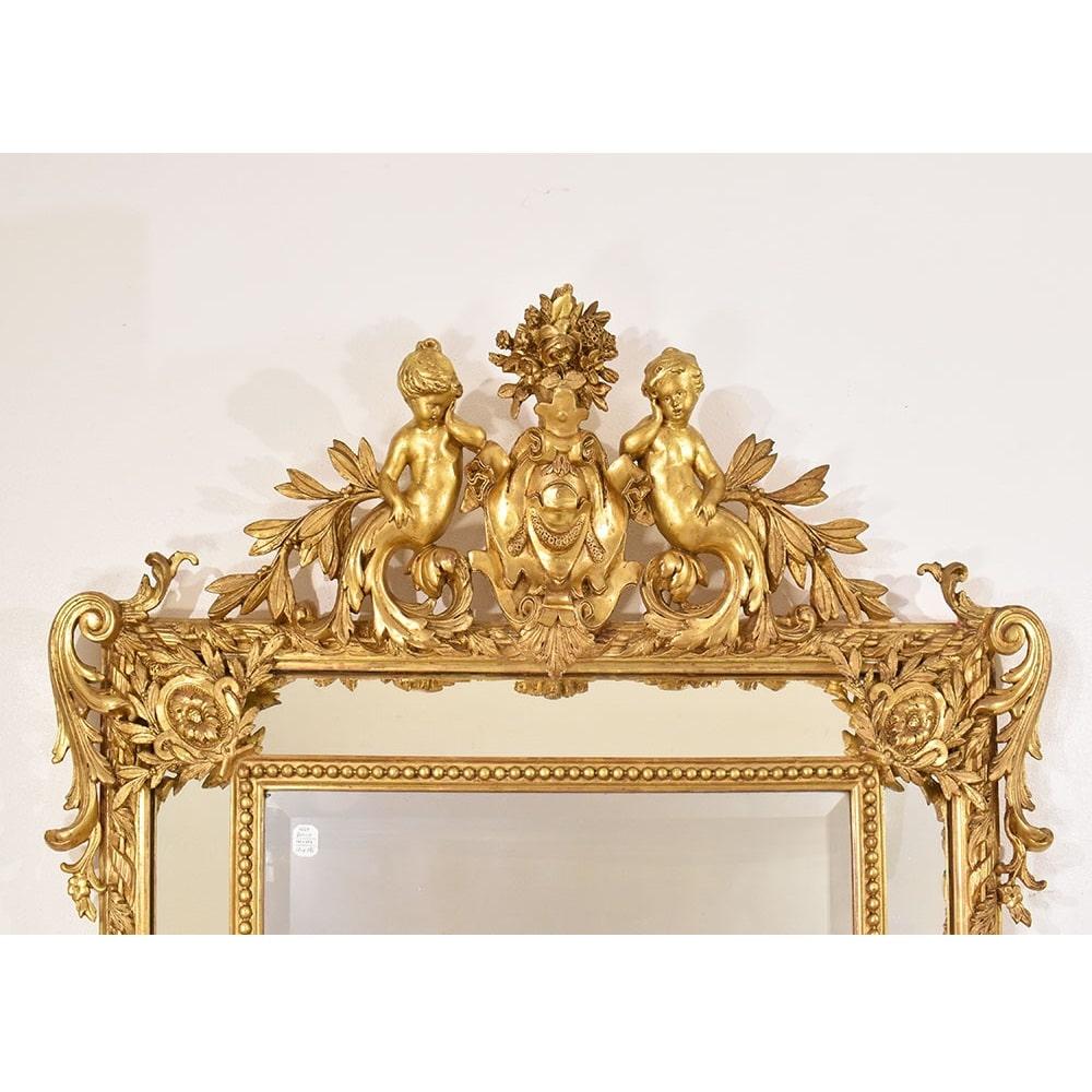 French Specchiera Antica Con Putti E Volute, Dorata In Foglia Di Oro Zecchino,  XIX. in vendita