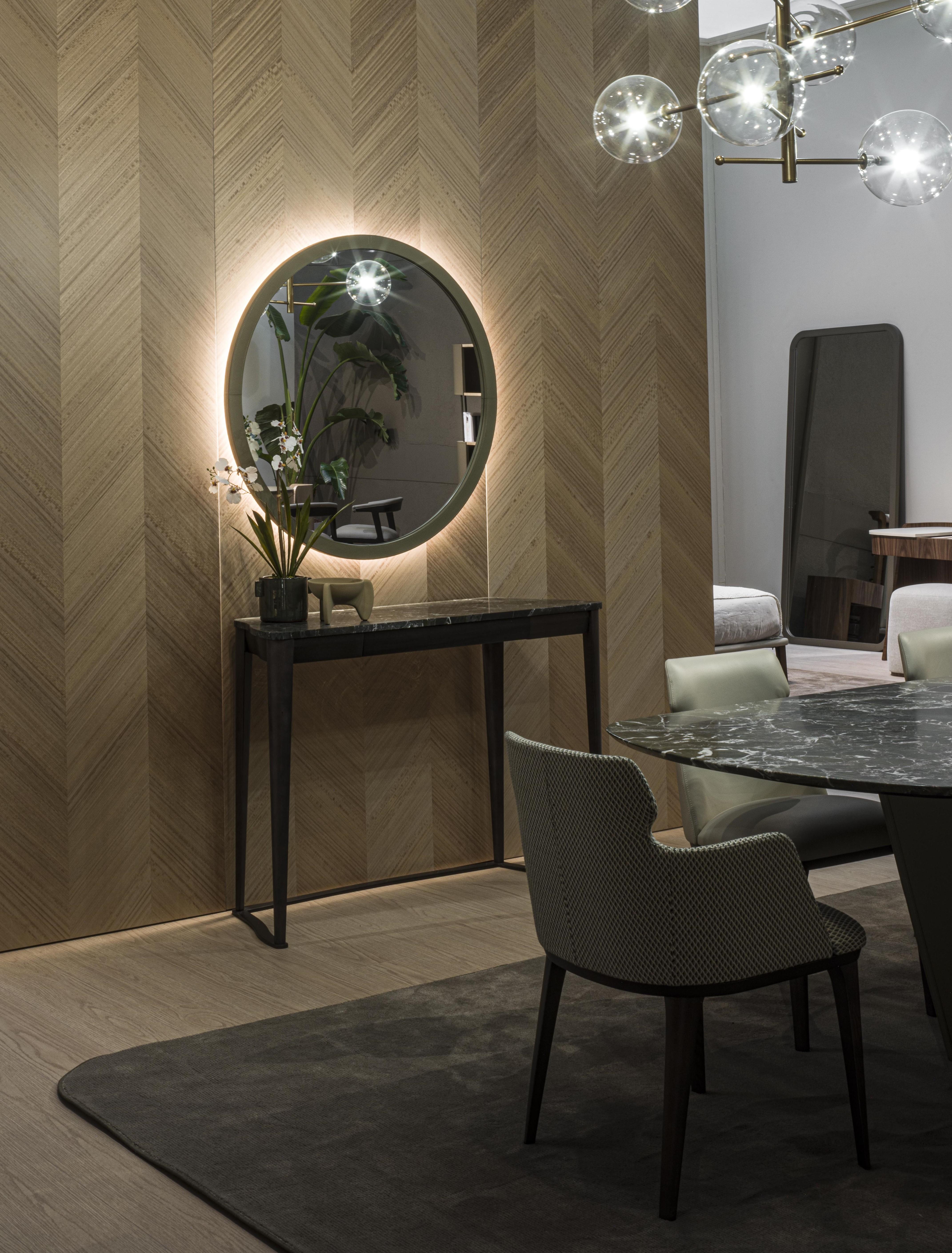 Modern Globe circular mirror with leather-covered edge and exposed stitching For Sale