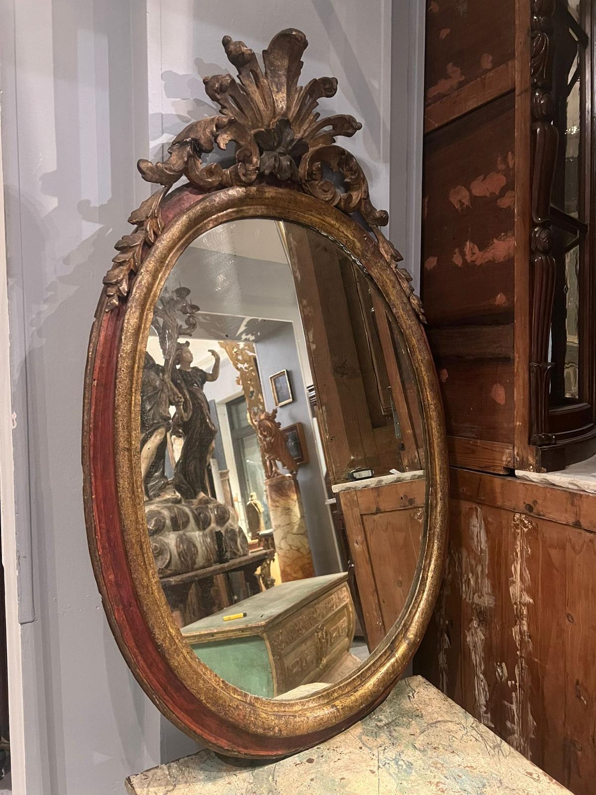 Italian Mirror of oval shape 18th century  For Sale