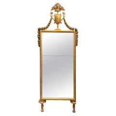 Louis XVI gilded wood mirror