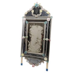 Murano glass mirror with floral motifs, Italy, ca. 1950.