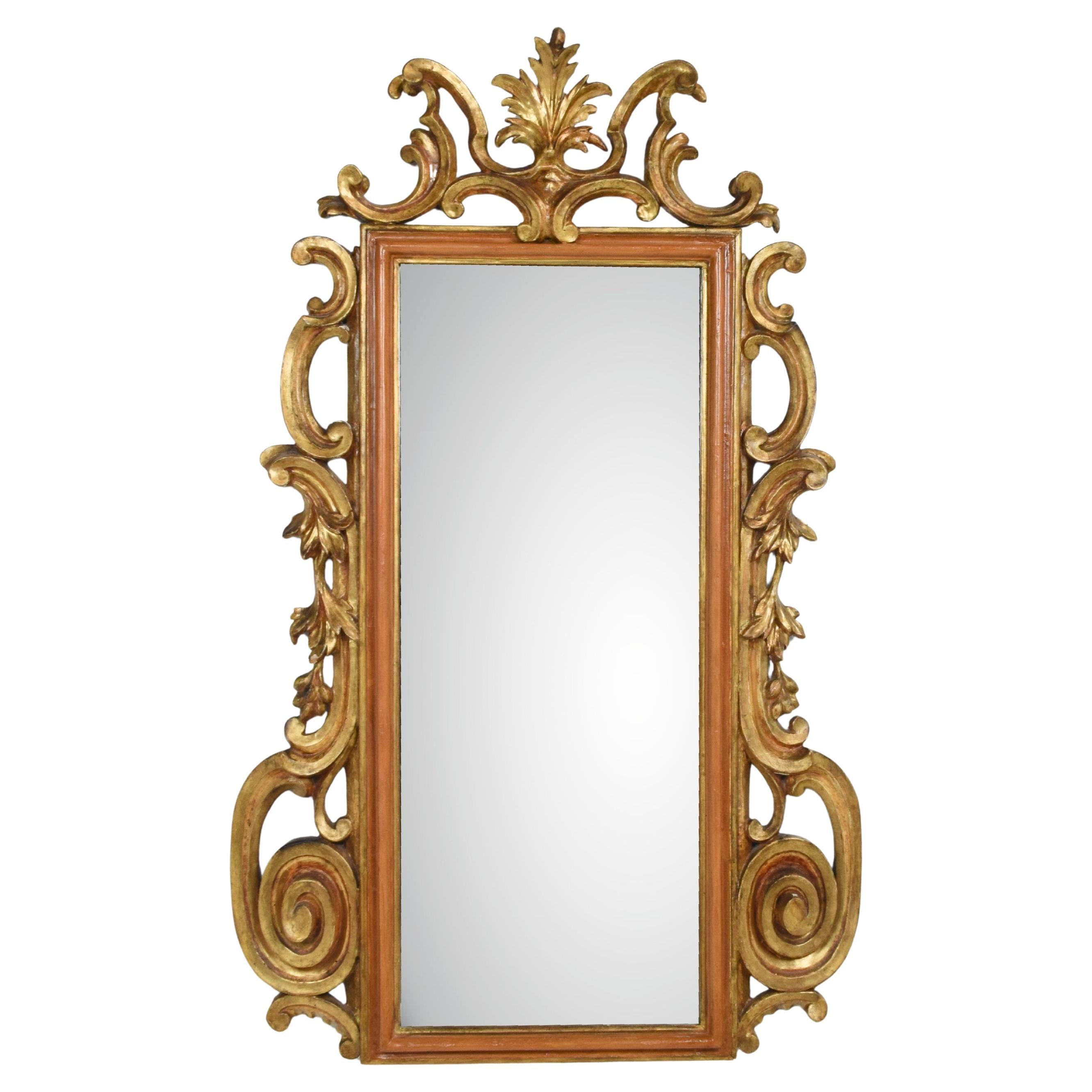 Carved and gilded mirror Gold Zecchino, central Italy, early 18th cent For Sale