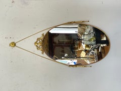 Oval mirror in gilded brass – Hollywood Regency style, Italy, 1970s