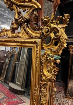 Carved and gilded mirror, Italy