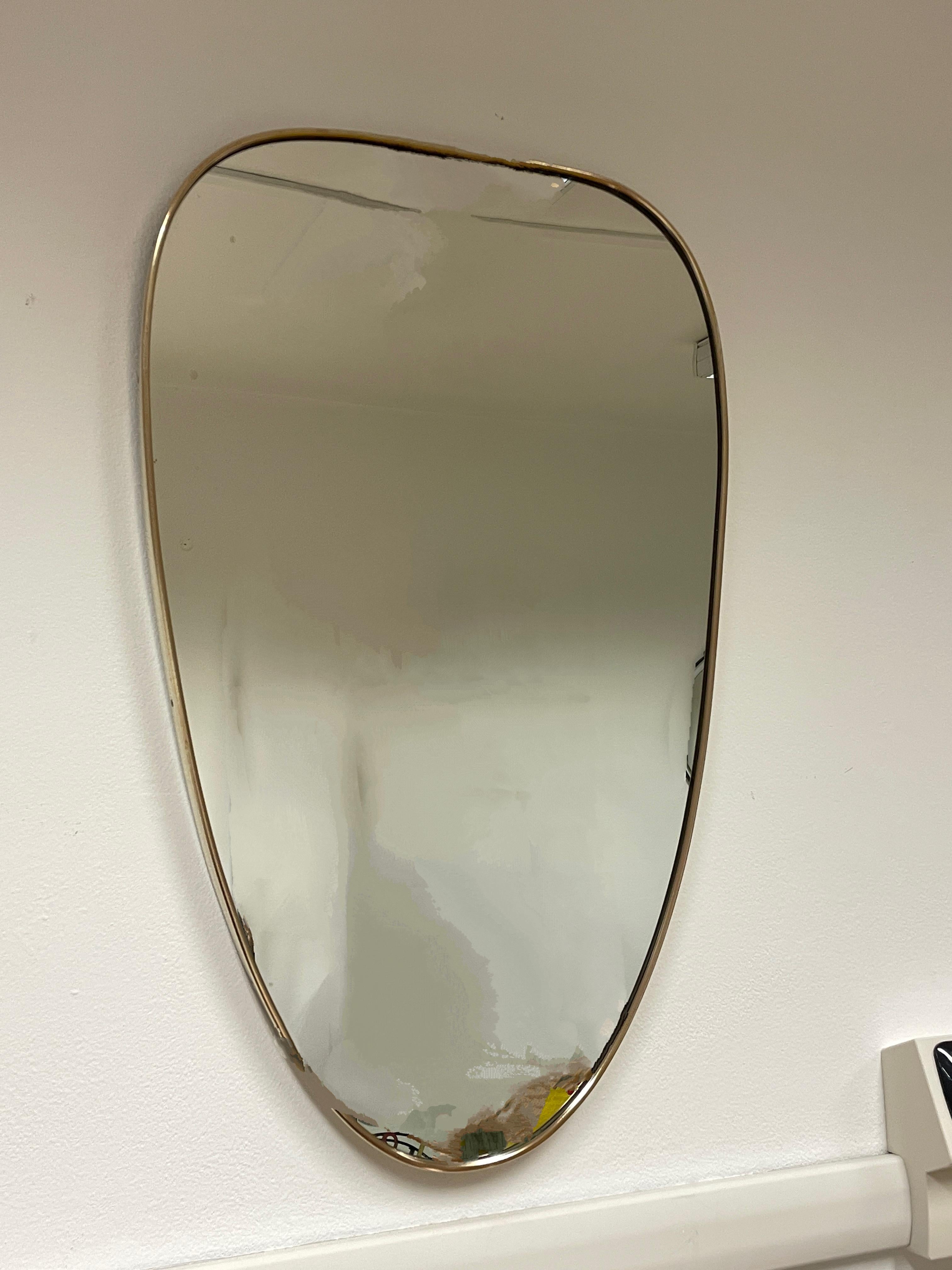 Mid-Century Modern 1950s shield mirror For Sale
