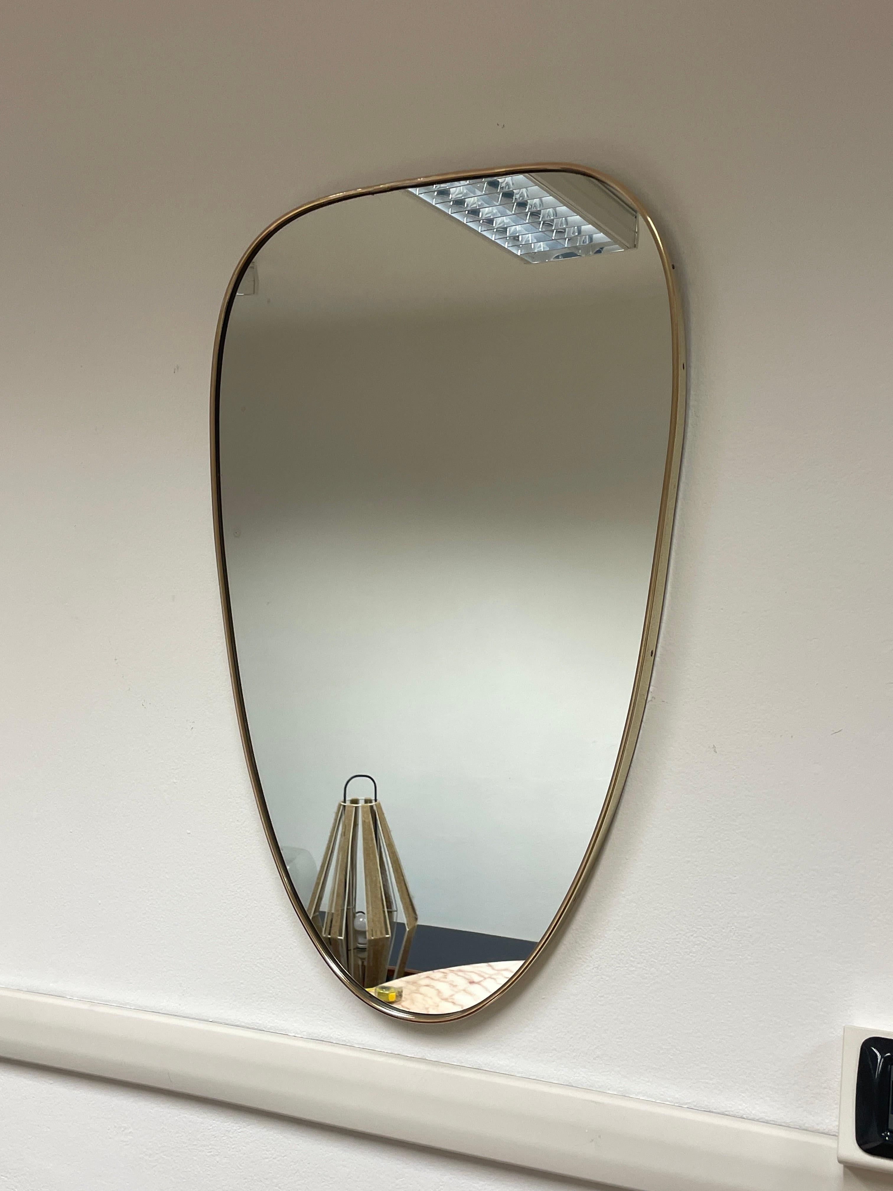 Mid-20th Century 1950s shield mirror For Sale