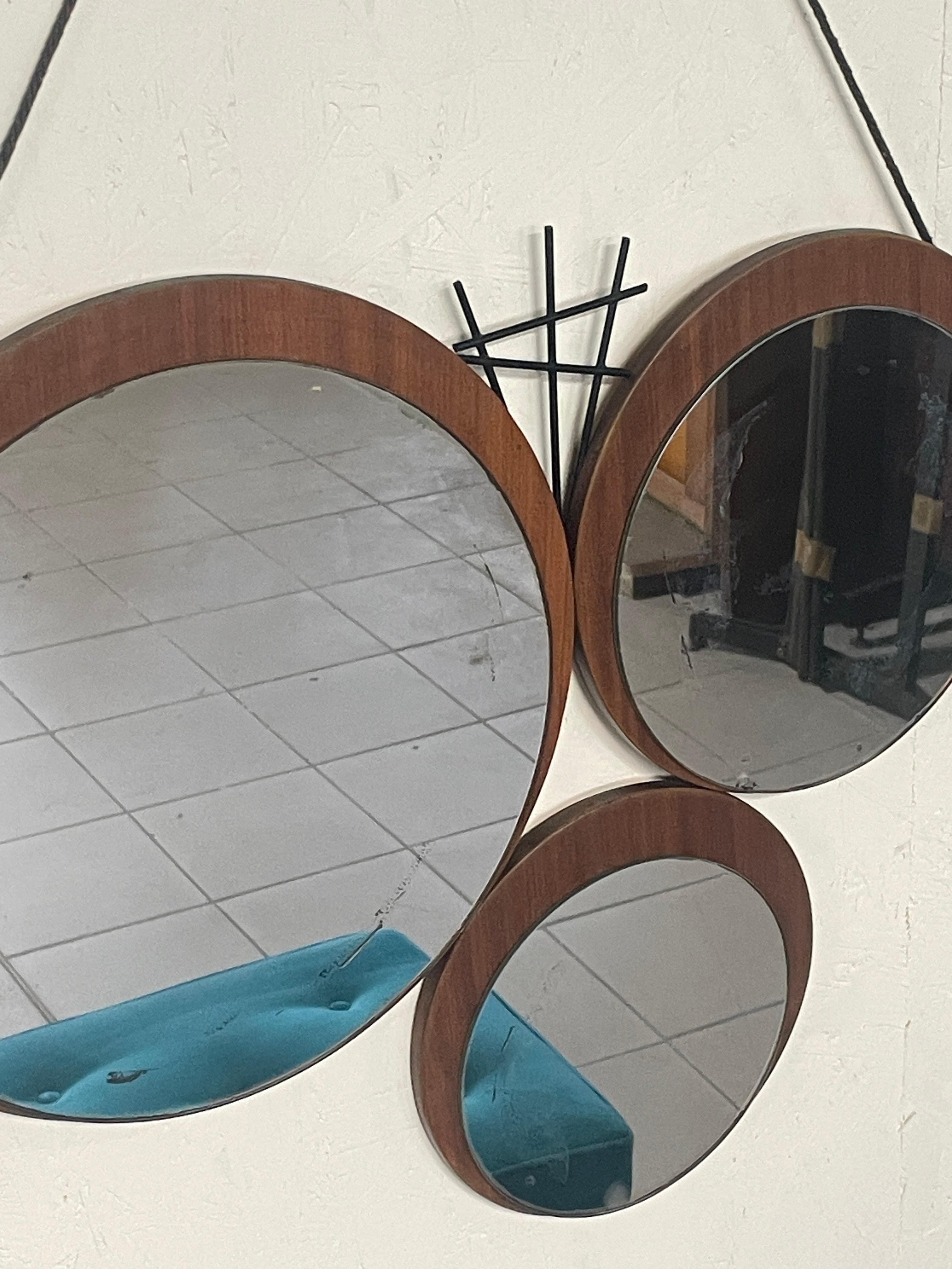 Mid-20th Century 1960s mirror with geometrically patterned teak base For Sale
