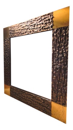 brutalist mirror in bronze and brass, design luciano Frigerio of Desio  1970