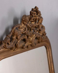 Specchio da parete in legno dorato e decorato inizio xx secolo in stile Barocco