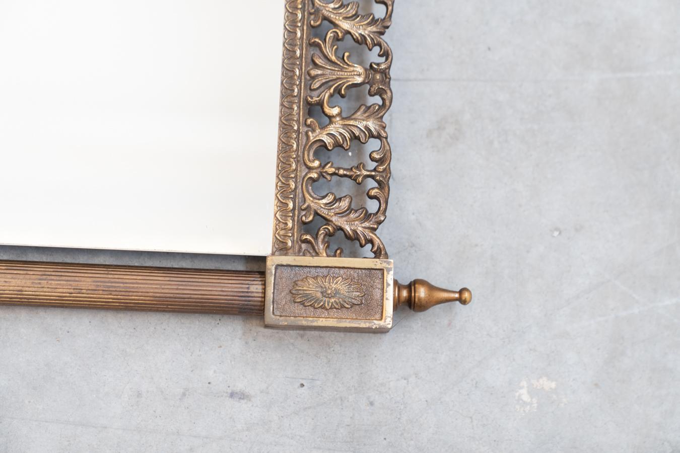 Wall mirror, brass with carved and pierced profiles at the top and For Sale 1
