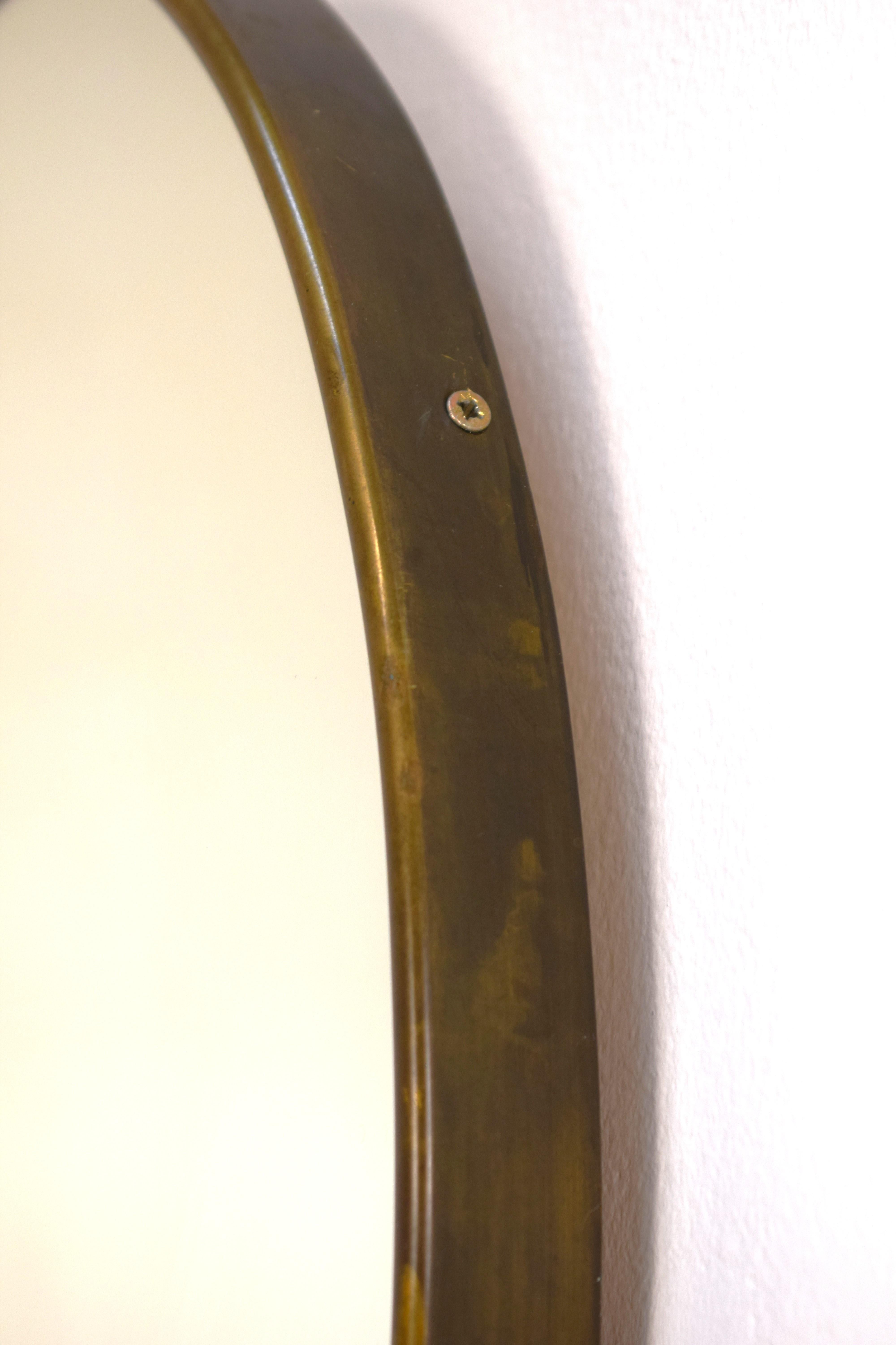 Brass wall mirror, Italy, 1950s. In Good Condition For Sale In Palermo, PA
