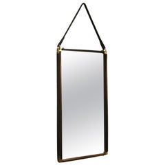 Teak, brass and leather wall mirror, Italy, 1960s