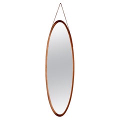 Vintage 1960s oval wall mirror in wood Italian design