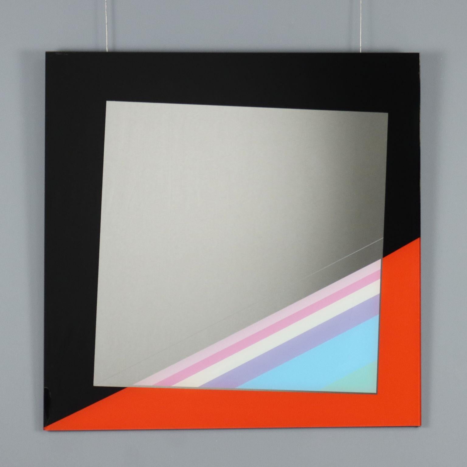 Decorative mirror from the series 'Gli Specchi di Carmi' with a square shape made of multicolored screen-printed glass. It features the production mark on the back. In good overall condition, has a crack on the lower right side as visible in photo.