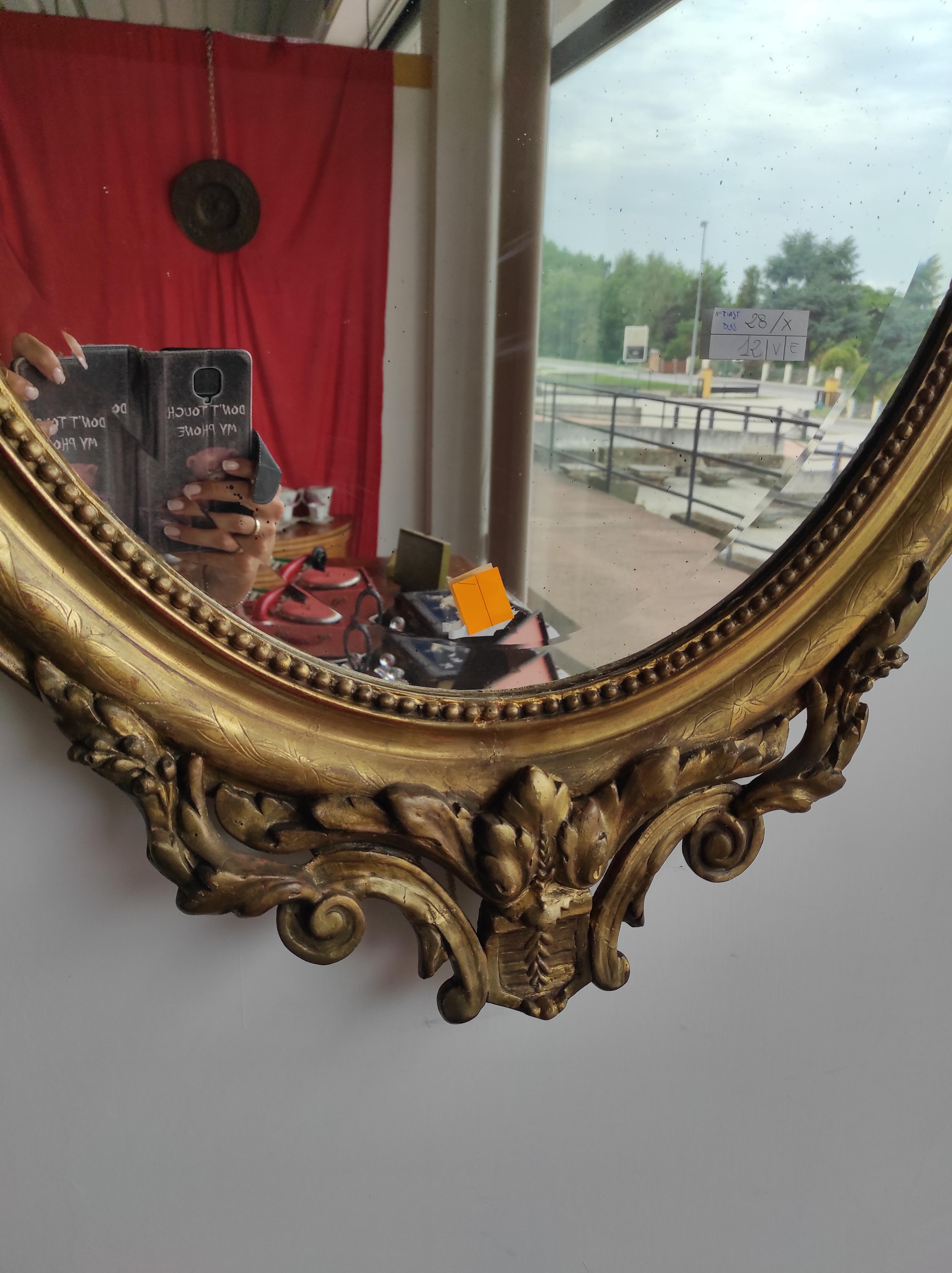 French Golden oval mirror For Sale
