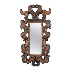 Specchio Fiorentino Intagliato e Decorato in Rosso Bolo e Argento Ossidato 1970s