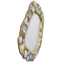 Specchio oro con decori in scagliola realizzato a mano in Italia da Cupioli