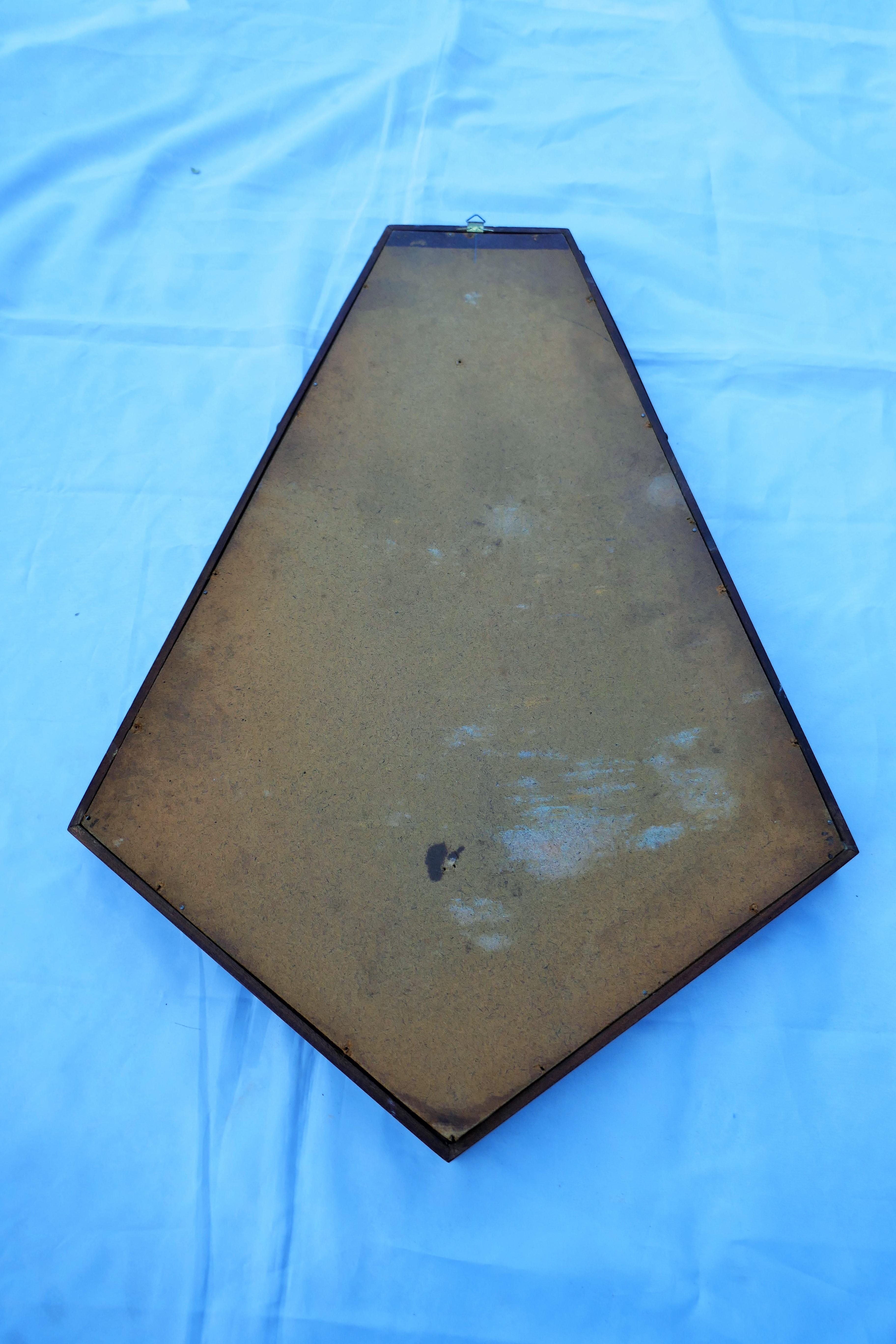Pentagonal mirror 
The leather stand for hanging the mirror is broken as pictured.
Good Condition
Thank you