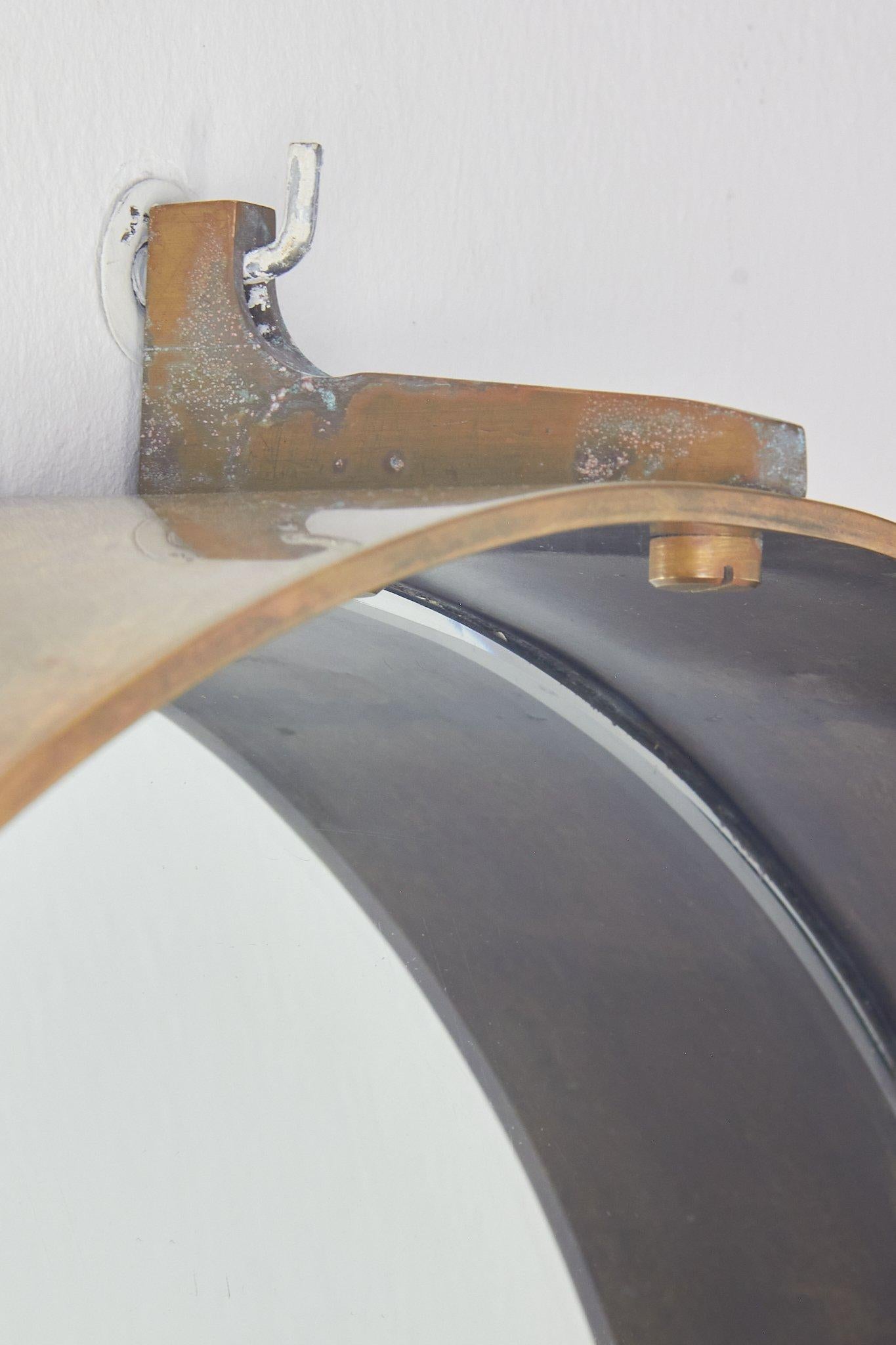 One-piece mirror with thick brass border made for a private residence in Rome in 1972 by renowned museographer Franco Minissi.
elegant and refined unique pieces for those who want something spaecial.