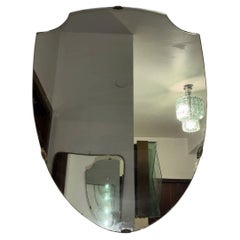 Gio Ponti-style brass wall-mounted Scudo mirror, 1950s