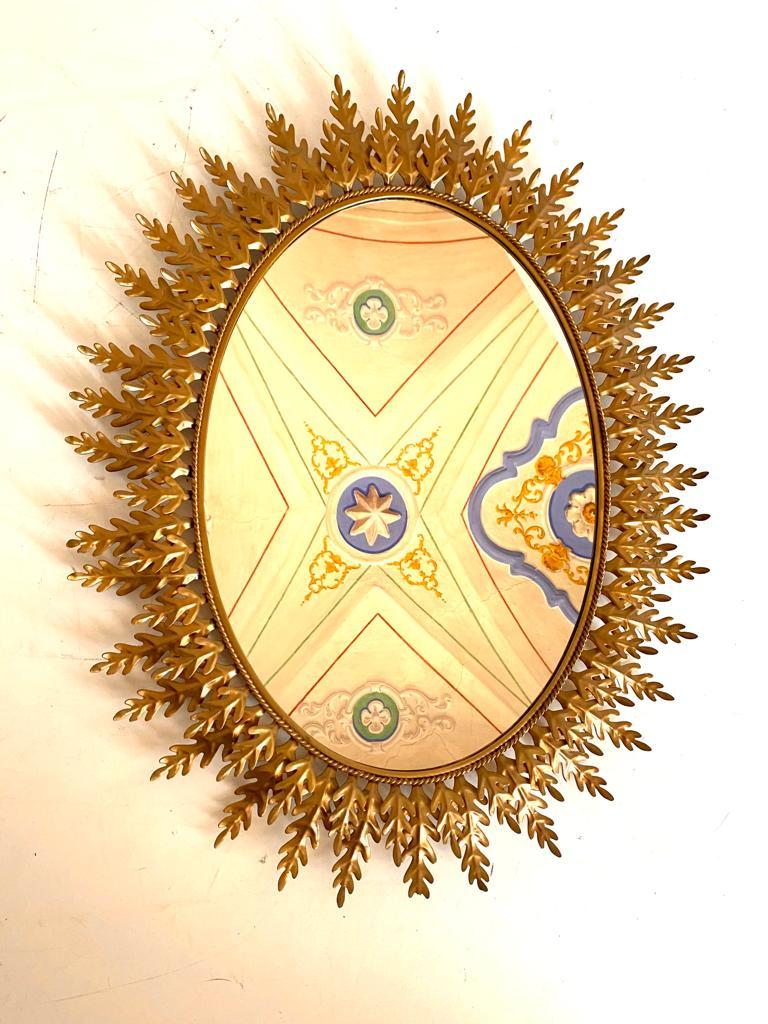 Mid-20th Century Specchio sunburst in ferro dorato, Italia anni 60