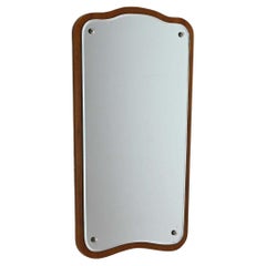 Vintage mirror with wavy frame