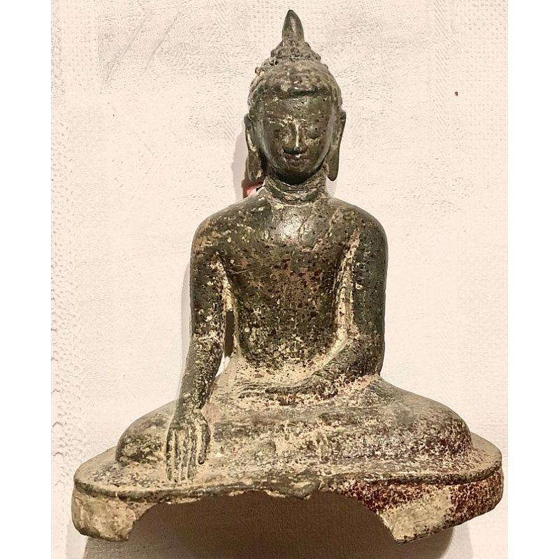 Material: bronze
Measures: 19 cm high 
Weight: 1.45 kgs
Pyu style
Bhumisparsha mudra
Originating from Burma
8th century
With few traces of 24 krt. gilding
With a very nice and beautiful, original patina !
Very small crack in the neck of the