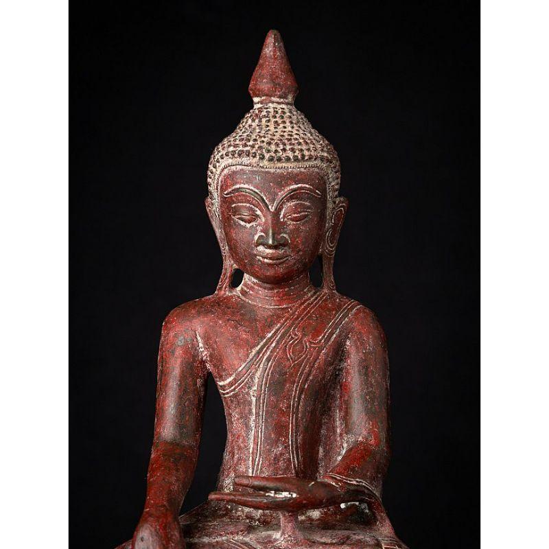 Material: bronze
44,7 cm high 
24,3 cm wide and 13,2 cm deep
Weight: 6.575 kgs
With original laquer
Ava style
Bhumisparsha mudra
Originating from Burma
17th century
Very special !
 