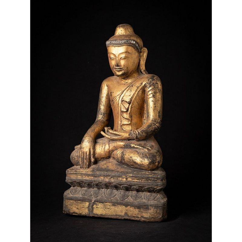 Material: wood
54 cm high 
30,5 cm wide and 17 cm deep
Weight: 6.841 kgs
Gilded with 24 krt. gold
Amarapura style
Bhumisparsha mudra
Originating from Burma
18th century
 