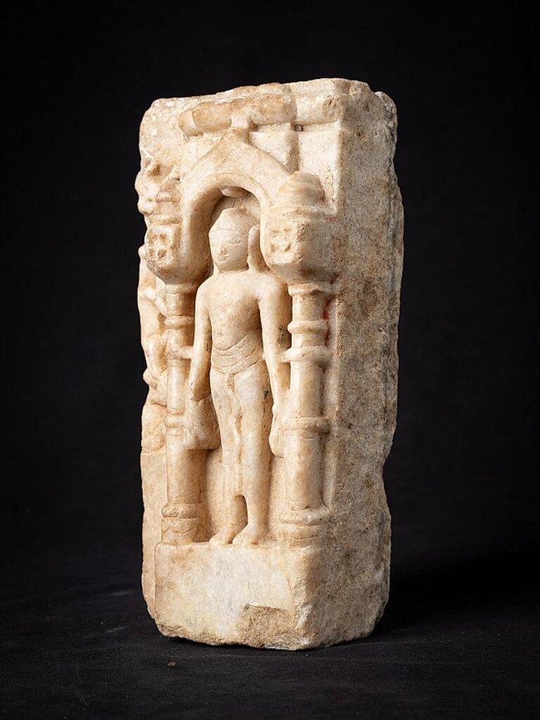 Material: marble
25,5 cm high 
11,5 cm wide and 9,5 cm deep
Weight: 5.5 kgs
Originating from a temple in Rajasthan
Originating from India
12th century.
 