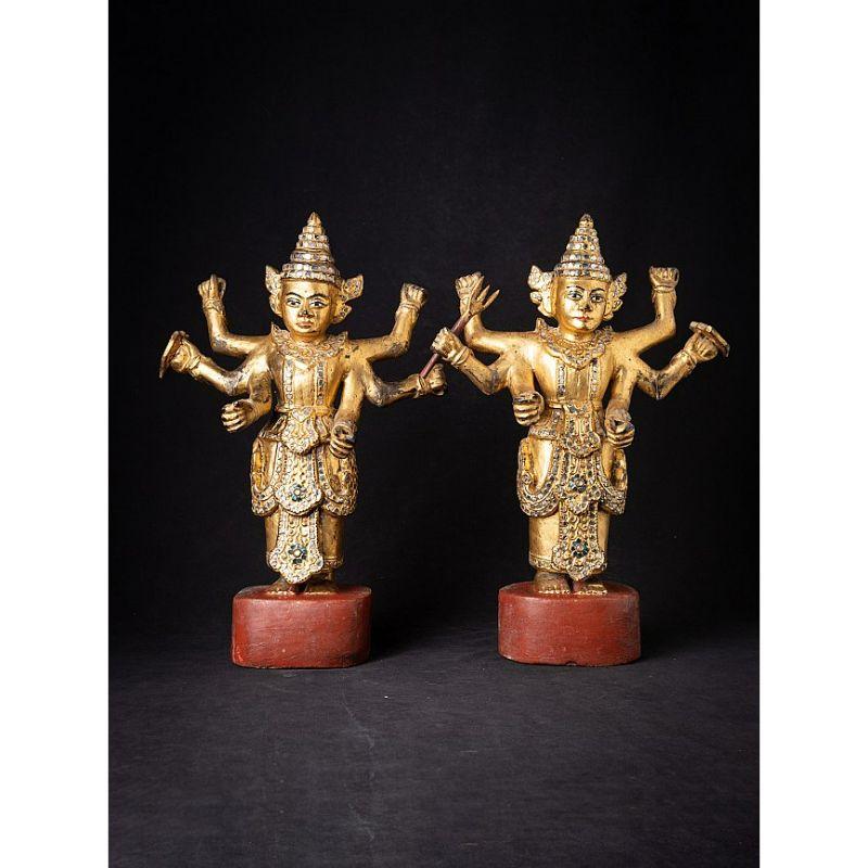 Material: wood
49,5 cm high 
35,5 cm wide and 17 cm deep
Weight: 4.65 kgs
Gilded with 24 krt. gold
Originating from Burma
19th century
With inlayed eyes
Missing a few attributes in the hands, but otherwise in very good condition !
A very