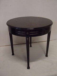 special Art Deco round black table with silver rim