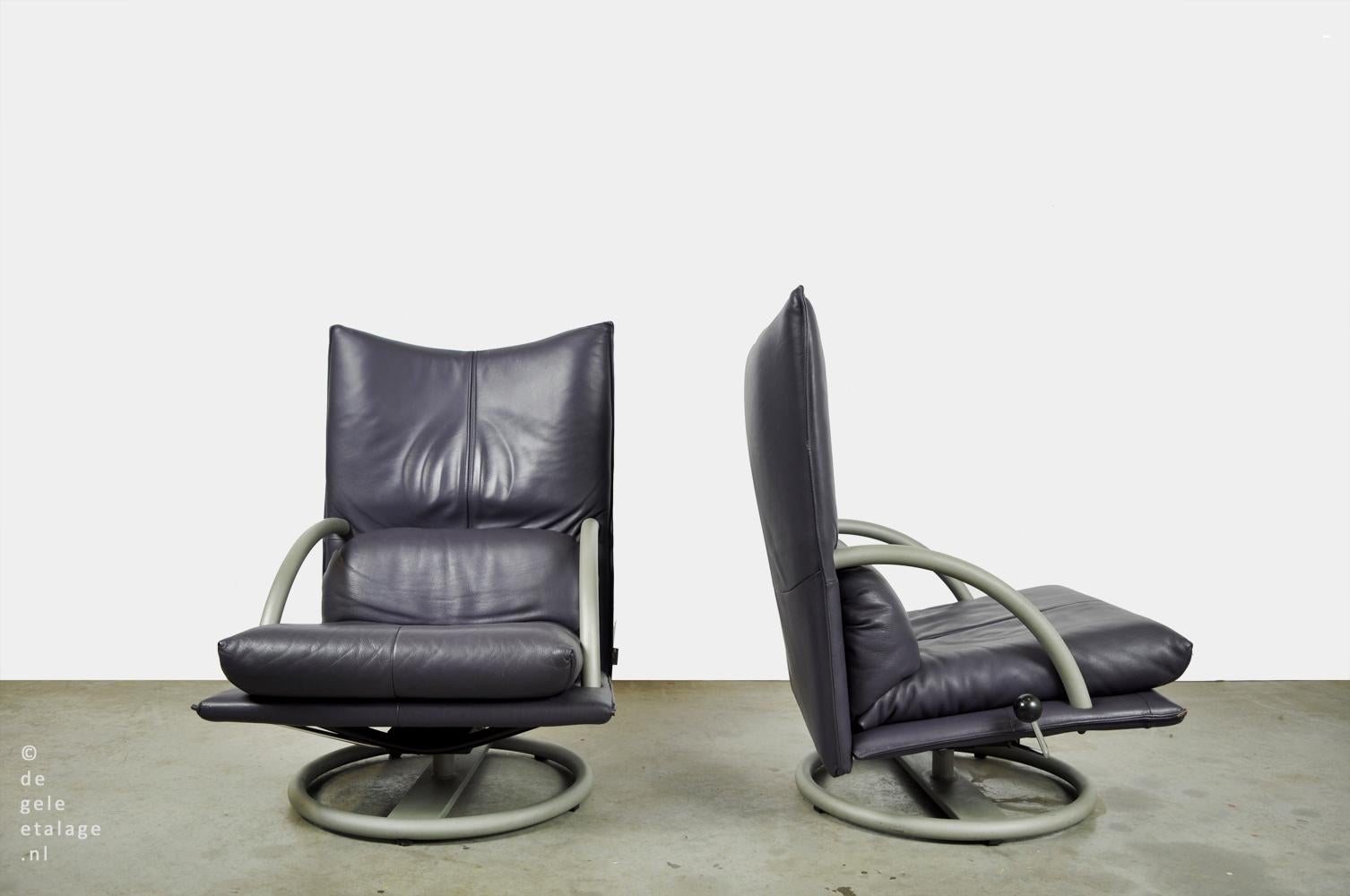 luxurious leather lounge armchairs in a special color, model 418 Torino BMP, designed and produced by Rolf Benz, Germany 1980. The armchairs stand on a matt gray coated steel frame that can rotate 360 degrees and have an adjustable backrest. The