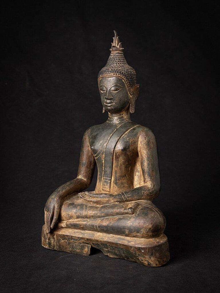 Material: bronze
33,3 cm high 
19,5 cm wide and 11,2 cm deep
Weight: 3.15 kgs
With traces of the original laquer and gilding
Bhumisparsha mudra
Originating from Thailand
Early 15th century
A nice size and in very good condition.
High