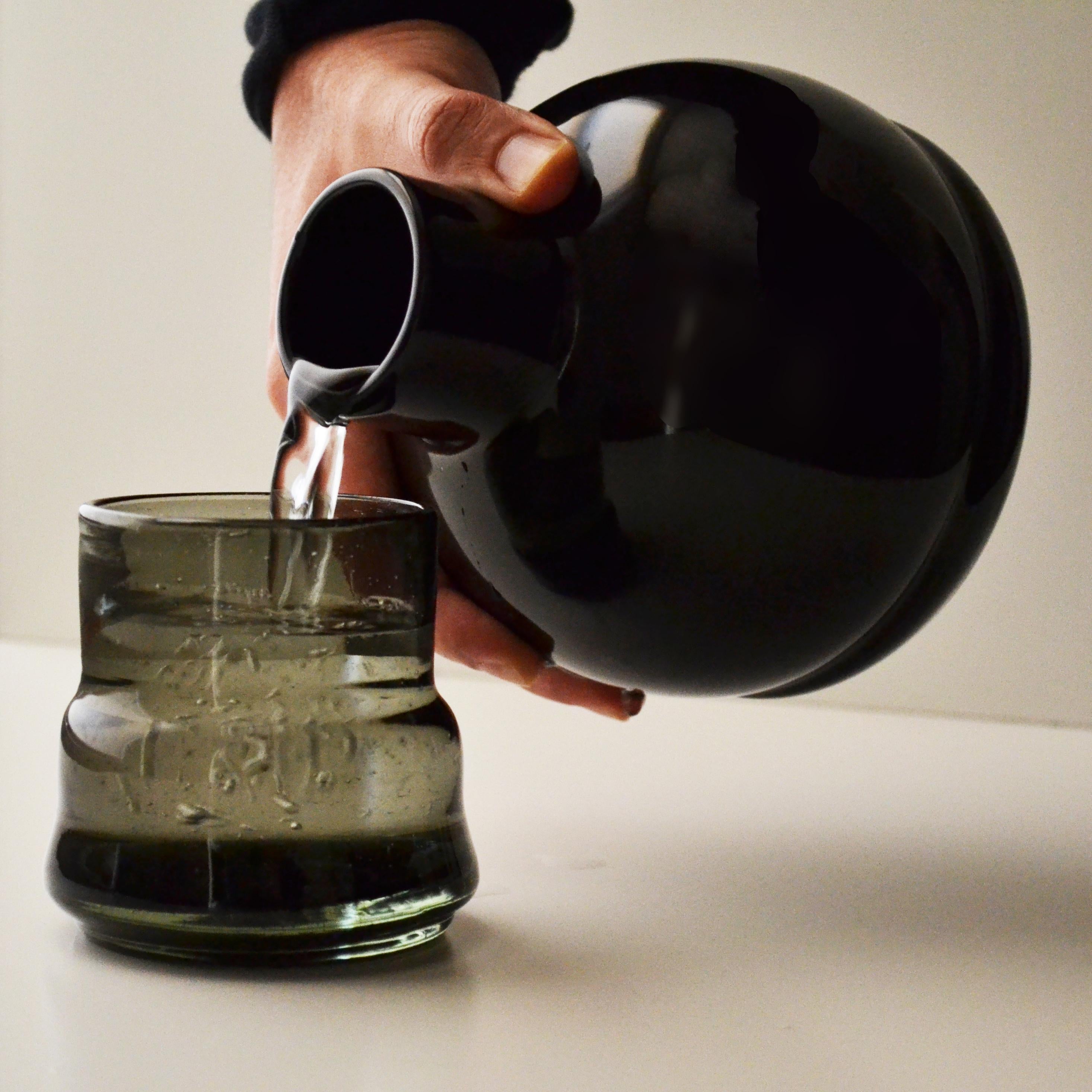 ceramic carafe with cup