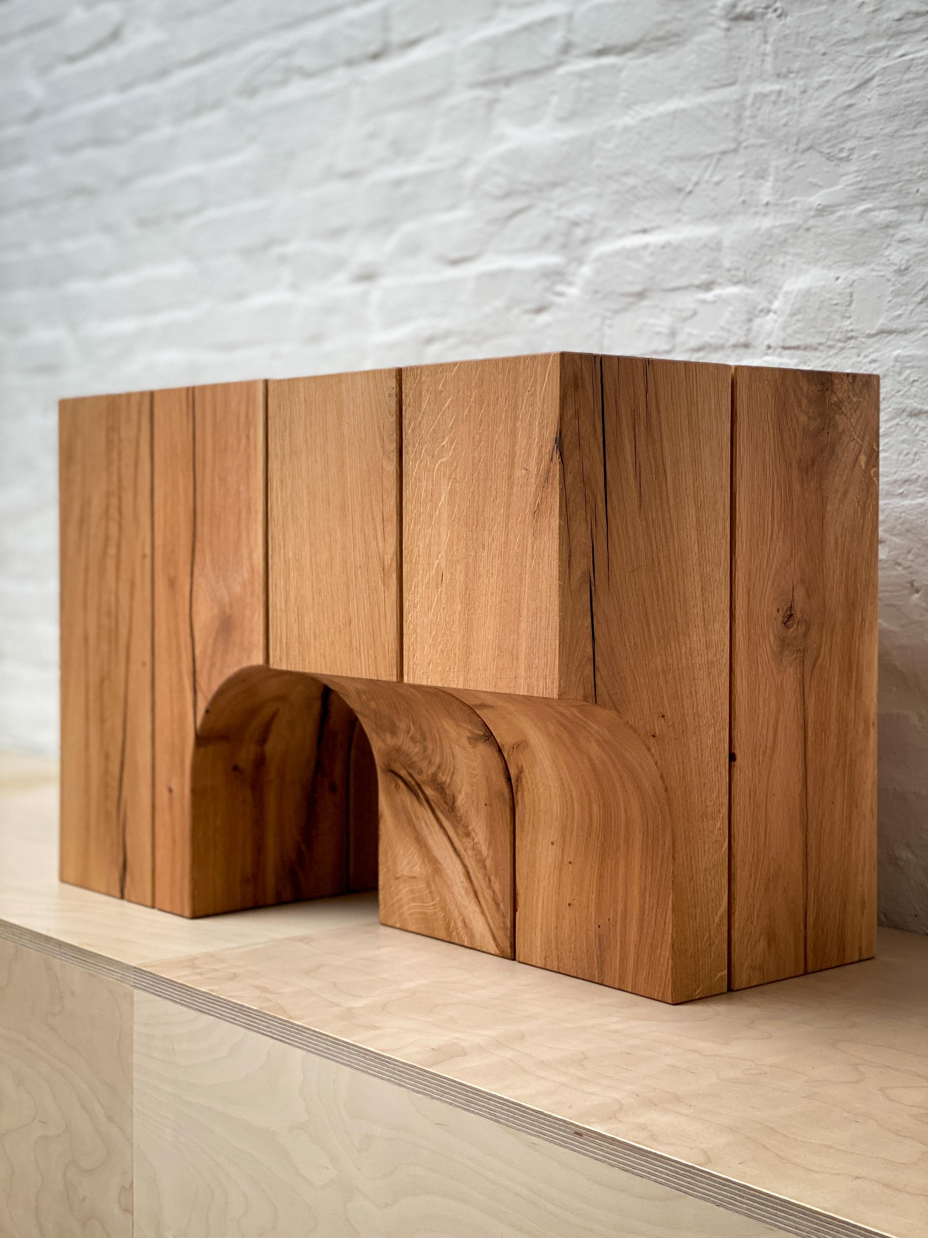 Modern Contemporary arch stool side table, natural oak & brass details, Belgian design For Sale