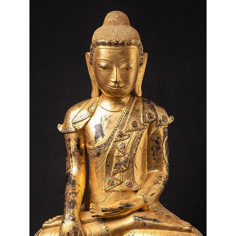 Material: lacquerware
75,1 cm high 
49,5 cm wide and 29,8 cm deep
Weight: 6.05 kgs
Gilded with 24 krt. gold
Shan (Tai Yai) style
Bhumisparsha mudra
Originating from Burma
18th century
Original antique Shan Buddhas in this size and quality