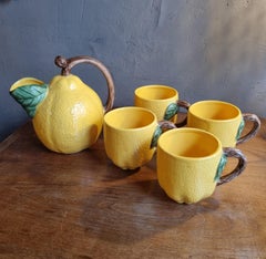 Special Listing für G: Zitronen-Keramik-Couchtisch, orangefarbene Terrine und Bambustablett