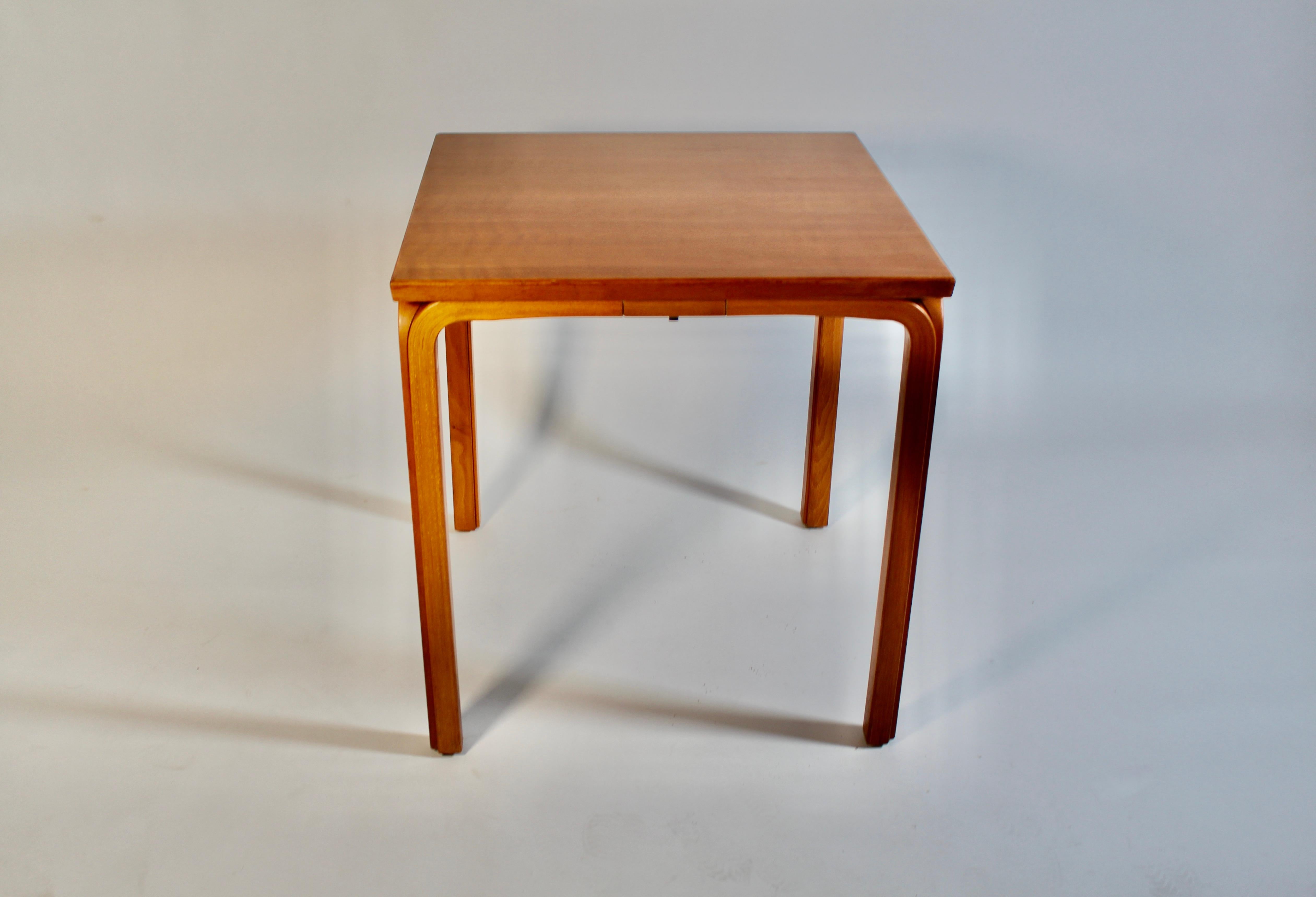 Scandinavian Modern vintage square like form side table from
plywood and birch dining table or side table by Alvar Aalto
designed circa 1946 Finland manufactured circa 1960.
A wonderful squared dining table or side table from birch, stained very