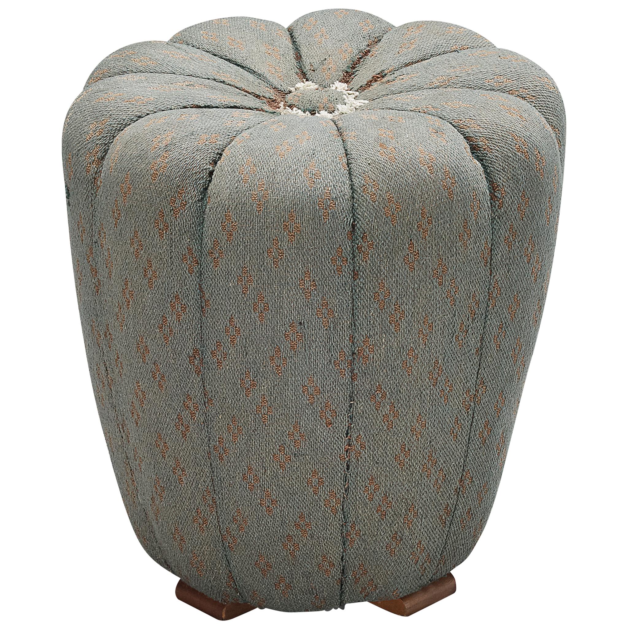 This poetic pouf is designed in the 1930s when the Art Deco Period was at its highest point and distinguishes itself by means of artistic upholstery that retained its original fabric and interesting construction. Halabala created a harmonious pouf