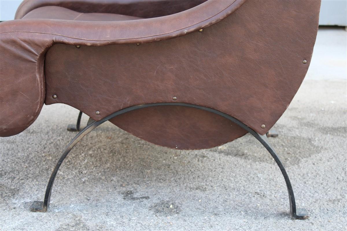 Special midcentury Italian design armchair faux leather 1950s metal foot.