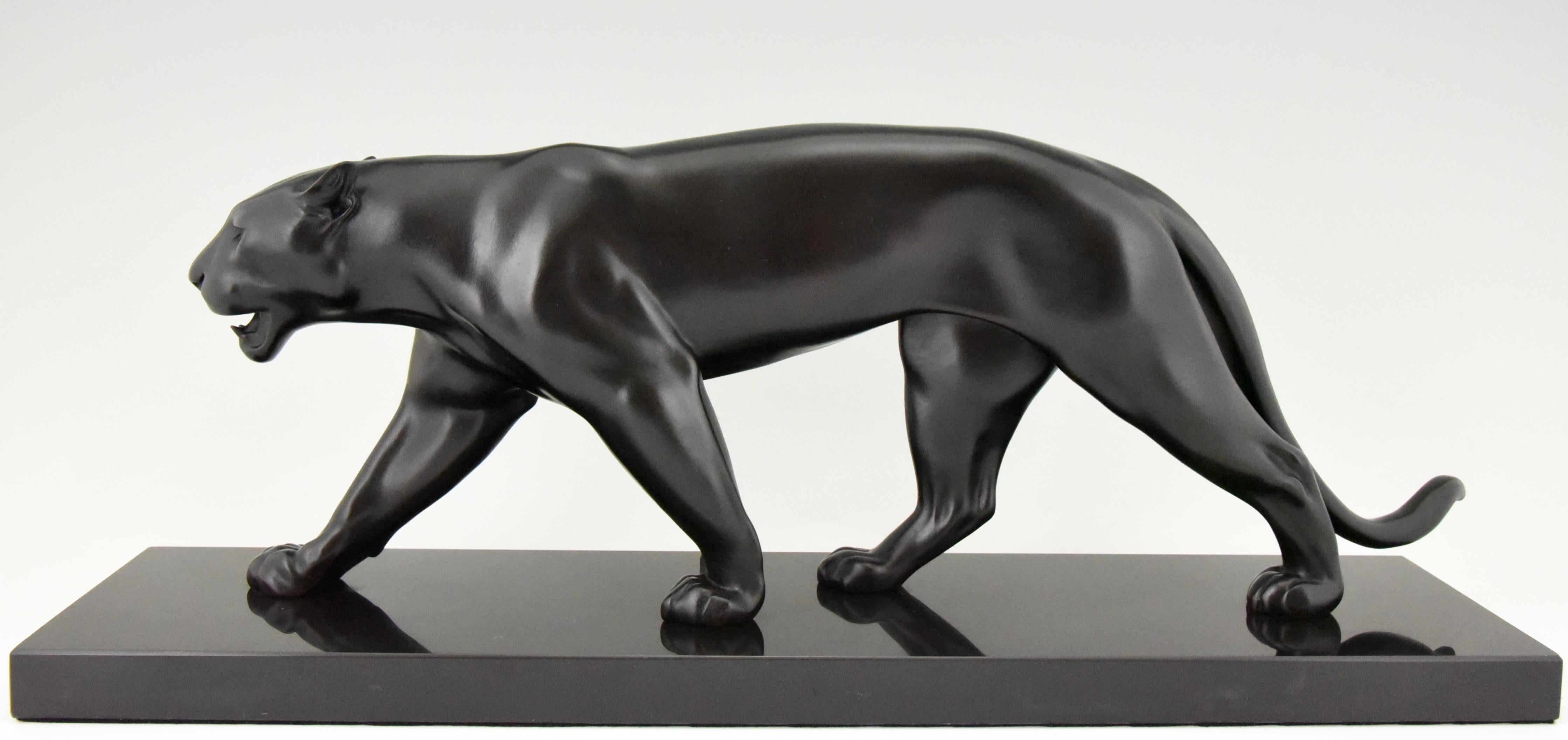 Art Deco style panther sculpture BAGHERA by Max Le Verrier.
Signed Le Verrier and with foundry mark Le Verrier Paris. 
Designed around 1920. Posthumous contemporary cast. 
Patinated Art Metal on black marble base. 

Handcrafted. 
Original sculpture