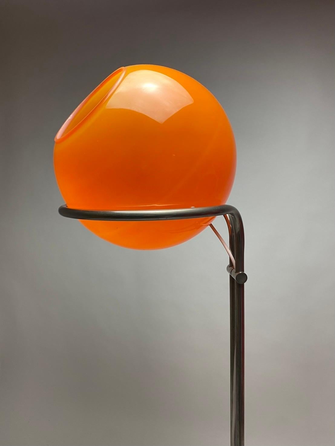 Stunning, breathtaking and very rare floor lamp by Tibor Hazi 1973.

Talking about quality it doesn’t get much better. A real contemporary space age design. 

Hand blown thick orange glass with a base of nickle plated metal. 

Tibor Hazi a