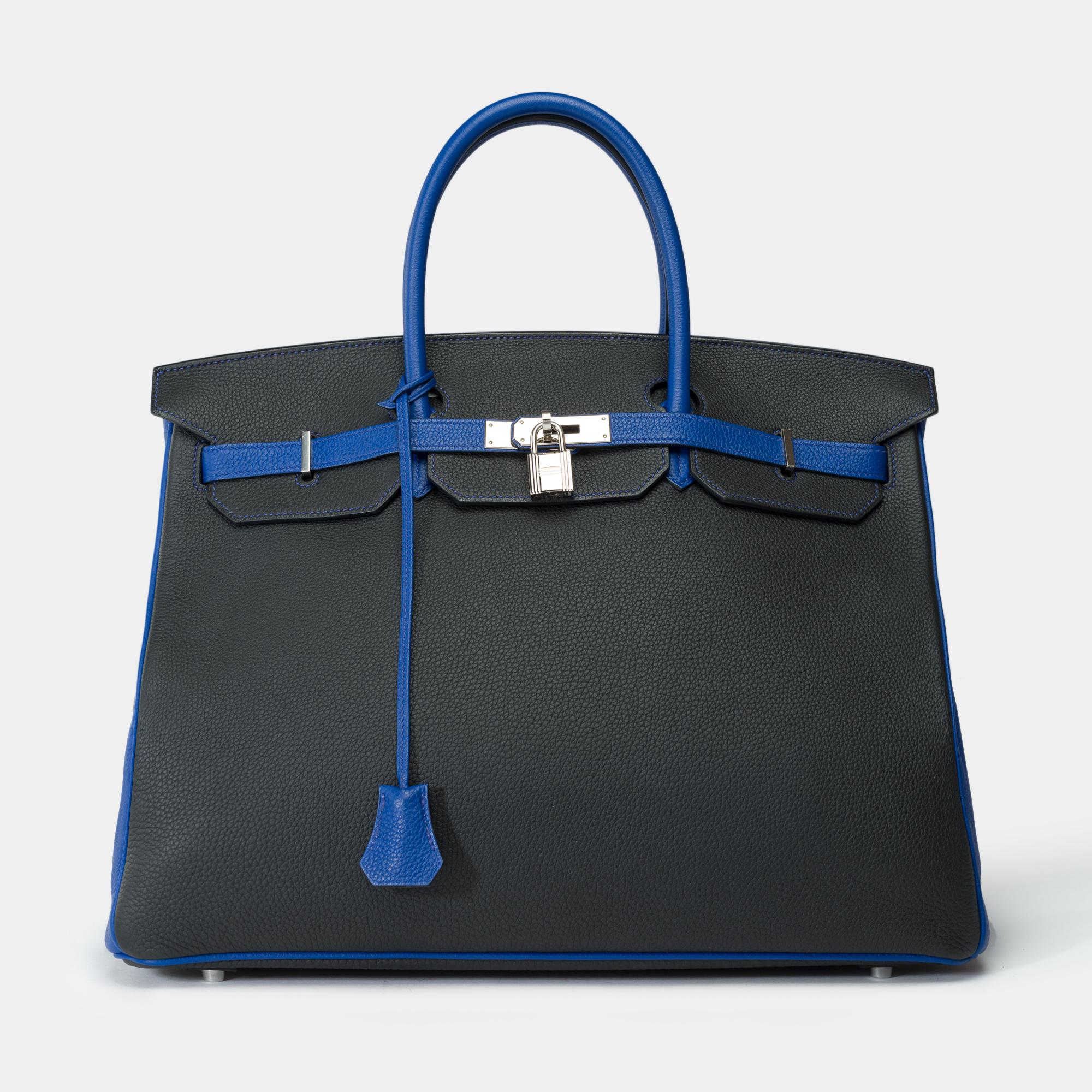 Exceptional​ ​and​ ​Rare​ ​Hermes​ ​Birkin​ ​40​ ​Special​ ​Order​ ​(HSS)​ ​handbag​ ​in​ ​black​ ​and​ ​blue​ ​electric​ ​Togo​ ​leather​ ​and​ ​blue​ ​stitching,​ ​palladium​ ​silver​ ​metal​ ​trim,​ ​double​ ​handle​ ​in​ ​blue​ ​leather​