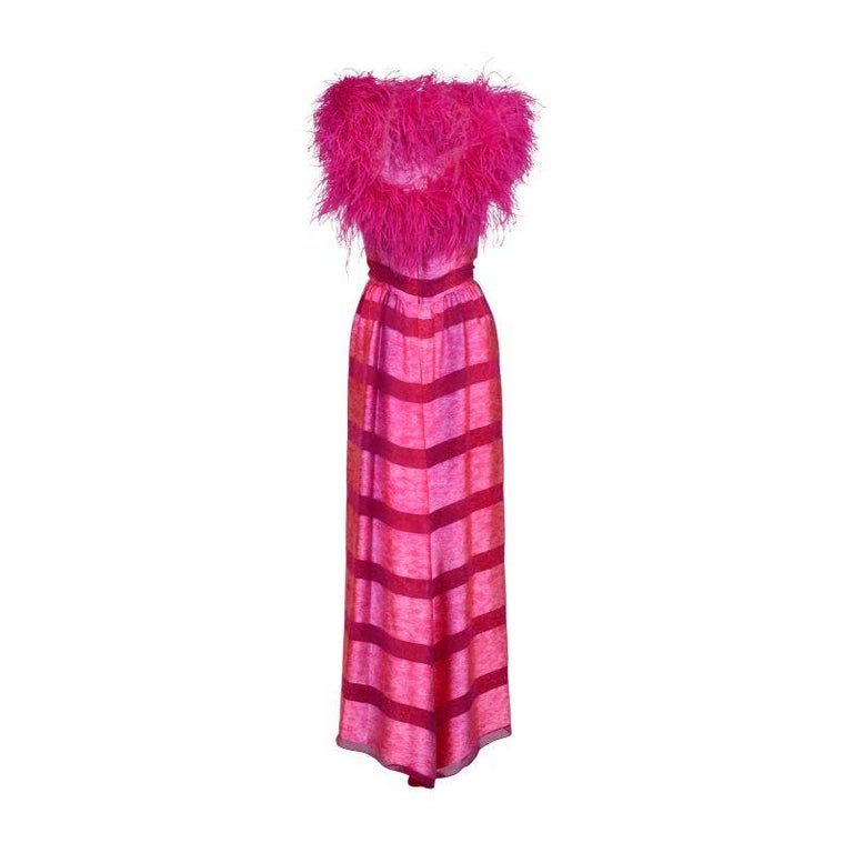 Incredible 1960's Richilene dress in vibrant pink stripes with marabou feather trim and off-the-shoulder sleeves, coupled with pink camisole straps. Full length silk column gown with subtle, abstract pattern throughout. As seen on Kacey Musgraves