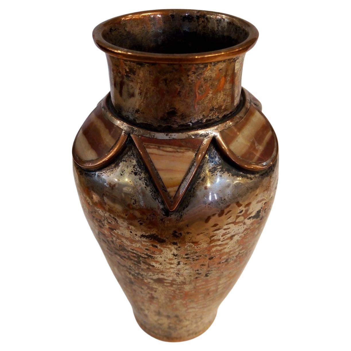 Beautiful small vase in hammered copper silver-plated made by Emilia Castillo from 