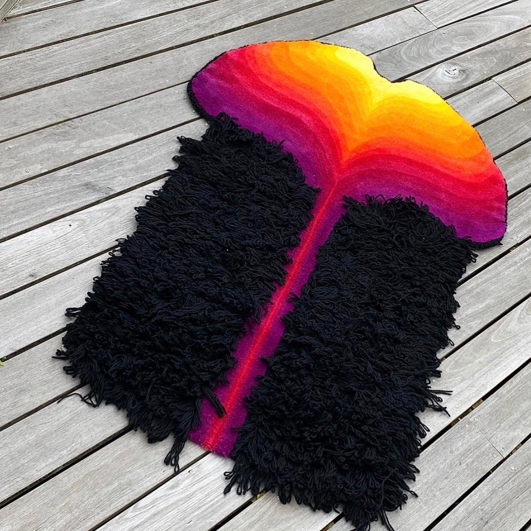 Beautiful colorful and very well made space age rug. The rug is in the style of Ewald Kröner who is known for his stunning artsy rugs. 

A psycadelic wall or floor rug with vibrant colors from purple to yellow. A real eyecatcher in the modern